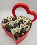 Pretzels and strawberries in heart